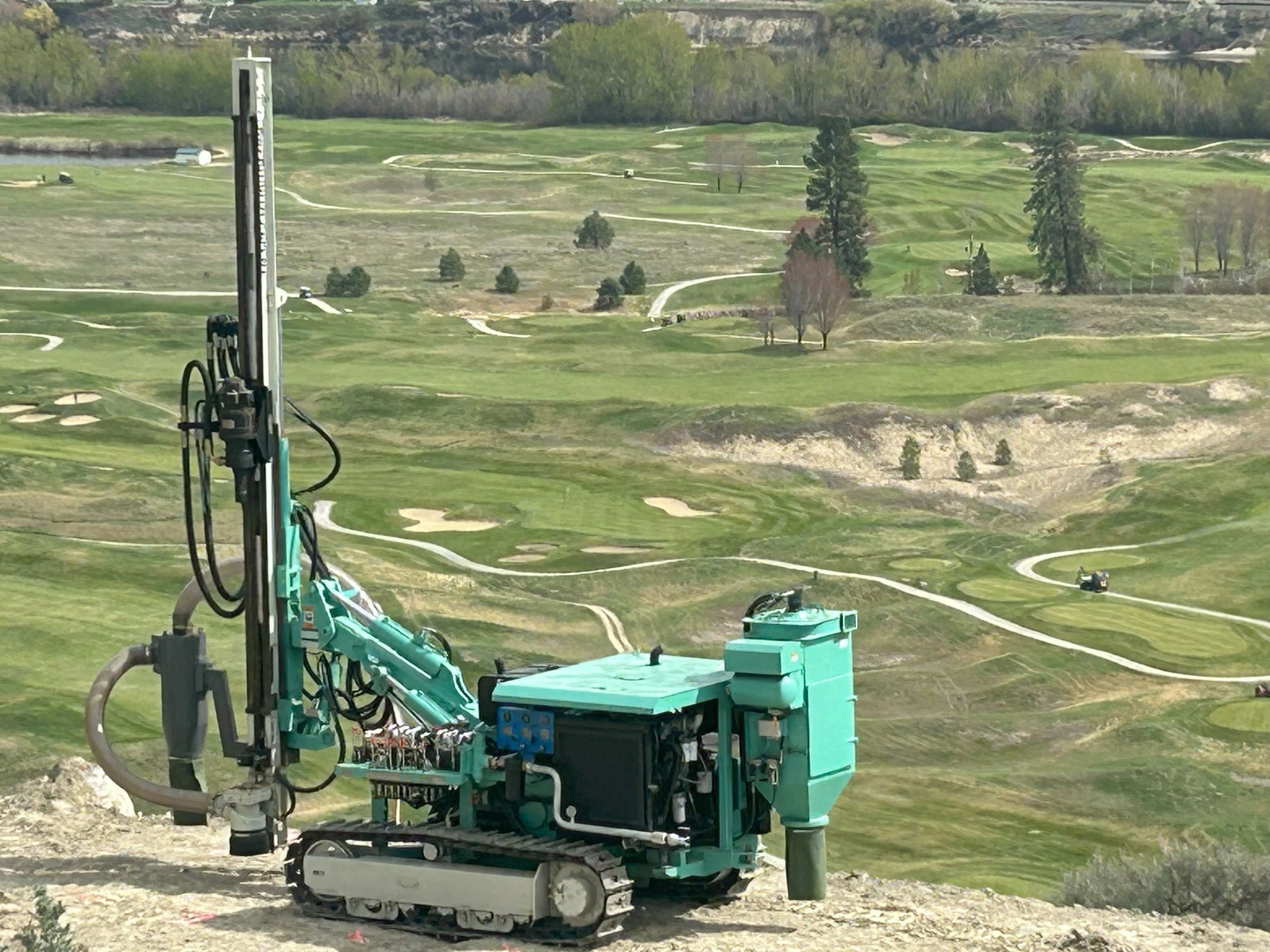 Our in-house rig installing Micro piles for a residential home on a steep slope.